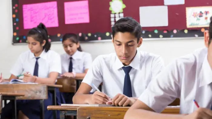 Indian kids writing