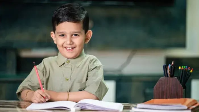 Indian kids writing