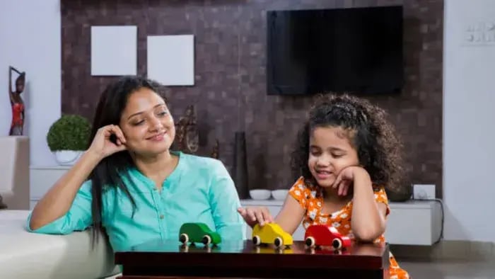 Indian kids playing with cars