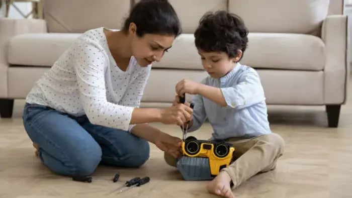 Indian kids playing with cars