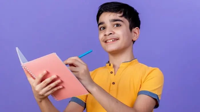 Boy Holding A Book