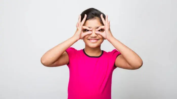 Indian Kid Doing Eye Exercise