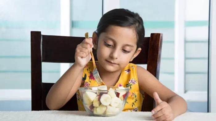 Indian Kid Eating Food