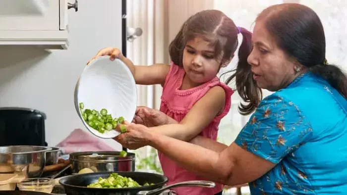 5 Practical Ways Children Can Support Their Parents at Home - Indian kids cooking with parents