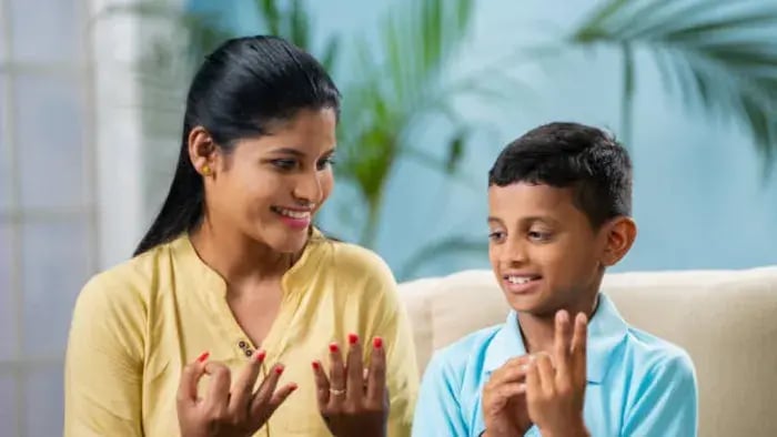 Indian kids and parents working on speech