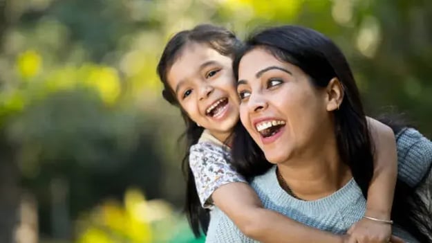 Indian kid with parents