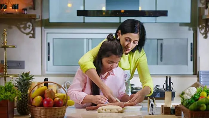 Indian Kid And Parents Cooking