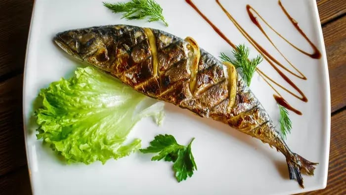 Cooked fish served in a plate