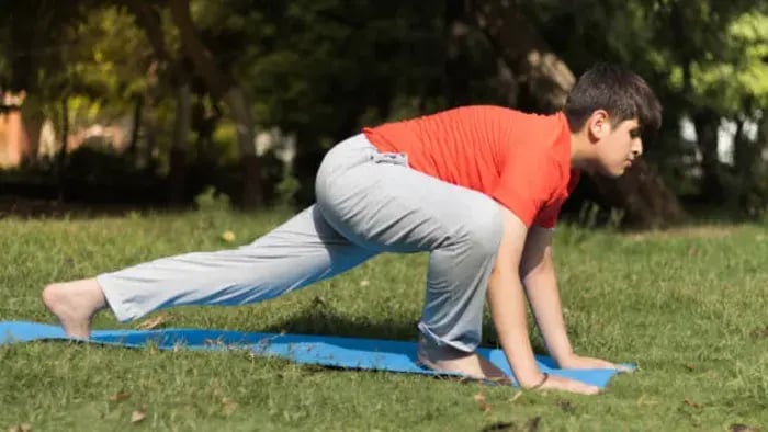 Indian Kid Doing Strength Exercises
