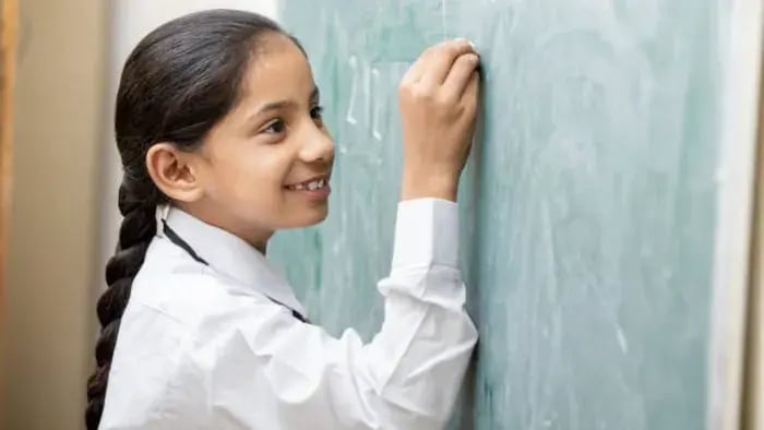 Indian Kid Doing Writing Exercise