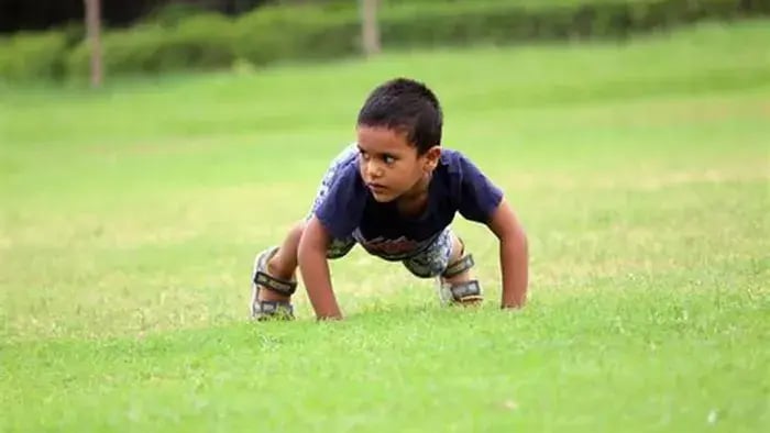Kid crab walking on grass