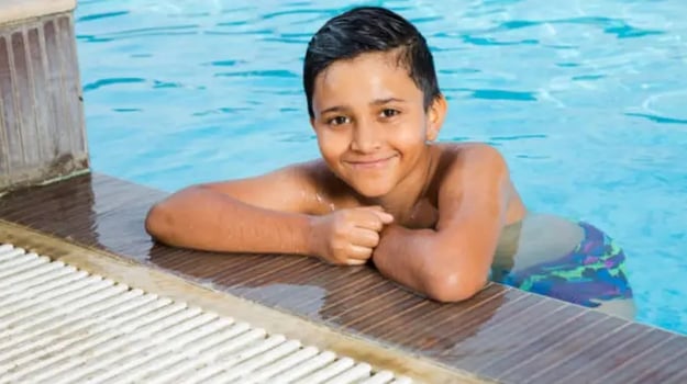 Indian kid swimming