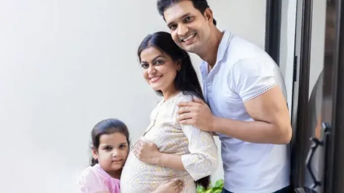 Indian kid with parents