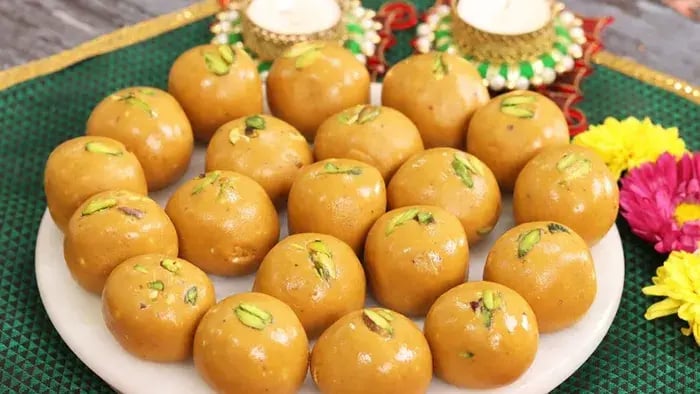 Besan ladoo served on a plate