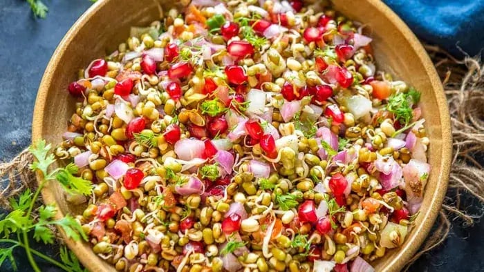 Sprouts salad mixed with onions and tomatoes