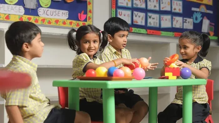 school kids playing in a classroom