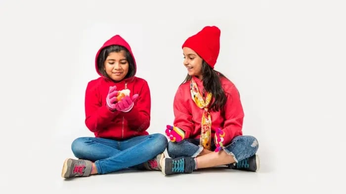 kids with winter clothes