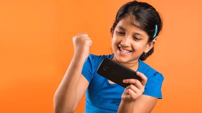 Girl Smiling Whole Using Phone