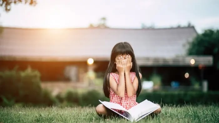 A Young Child Learns Poetry With Eyes Closed
