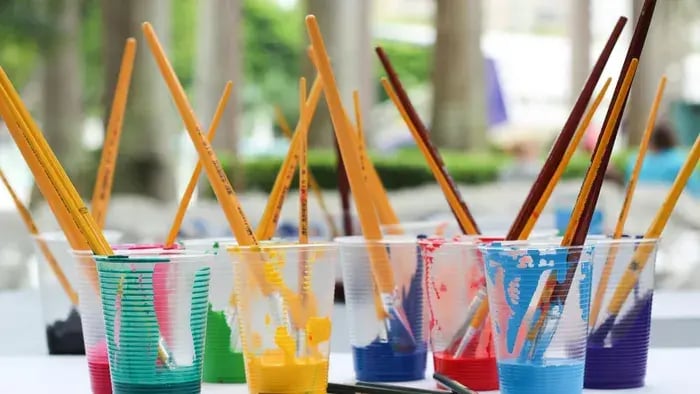 Painting Brush In A Plastic Glass