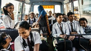 7 Reasons Why Students Should Wear Uniforms: Lessons in Equality and Discipline - Kids wearing uniforms in a bus