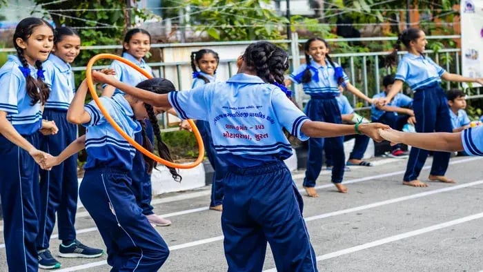 Girls playing in a circle