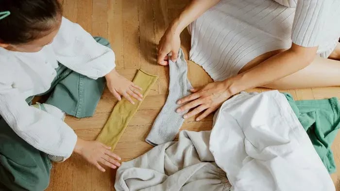 Bringing Fresh Laundry Back to Room