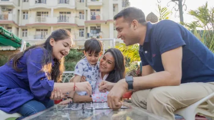 Indian kid with parents