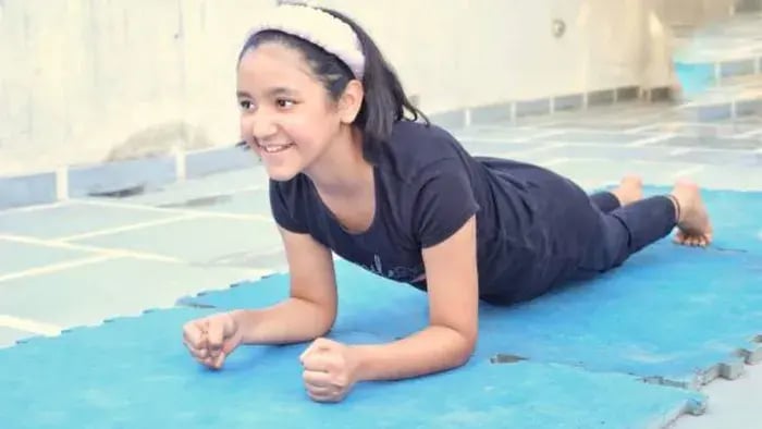 Indian Kid Doing Floor Exercises