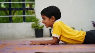 Indian Kid Doing Floor Exercises