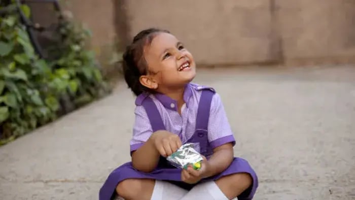 Indian kid drinking milk