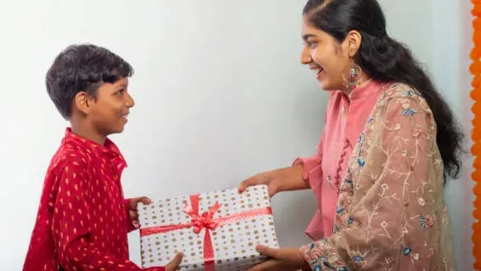 Indian Kid Gifting Parents