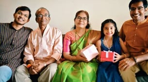 Indian Kid Gifting Parents