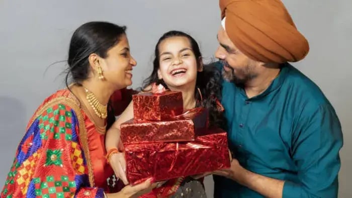 Indian Kid Gifting Parents