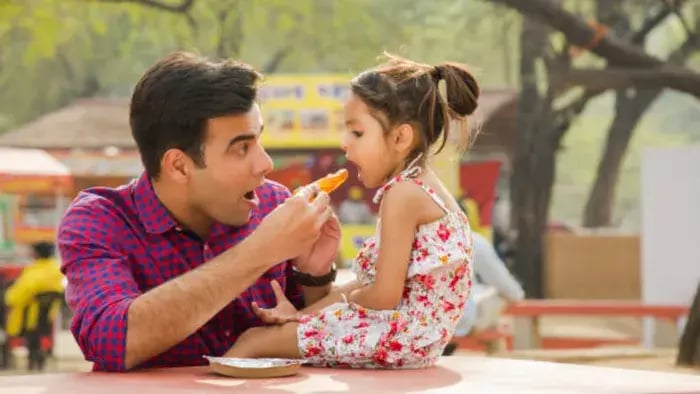Indian kids eating food