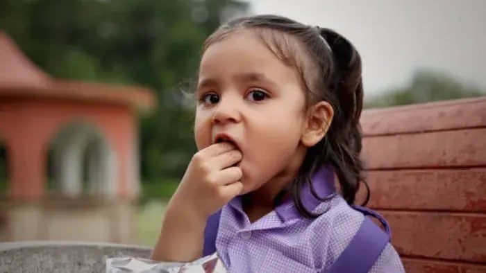 Indian kids eating food