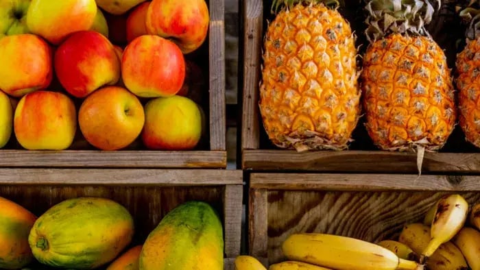 variety of fruits kept on a shelf