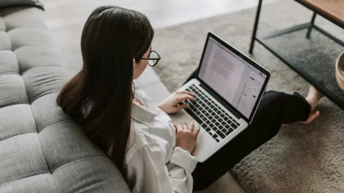 Kid Studying On A Laptop