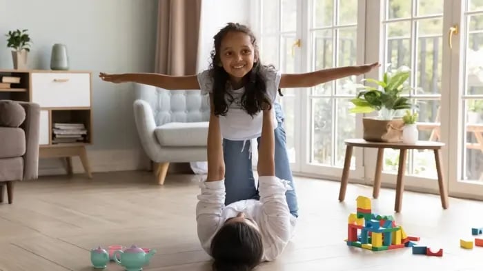 girl playing with mother
