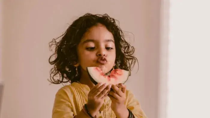 Indian kids eating food