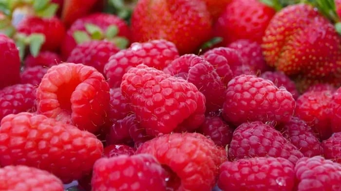 Luscious Strawberries And Raspberries