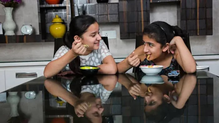 Indian kids eating food