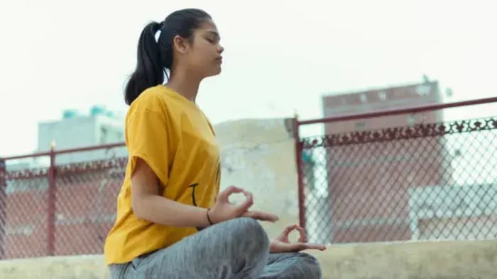 Effective Exercises for Teenage Girls: Stay Fit and Healthy - Indian teenager doing yoga