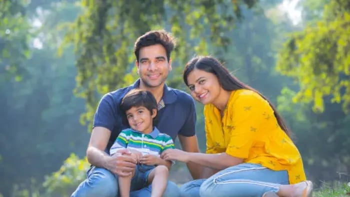 Indian parent sitting with their kids