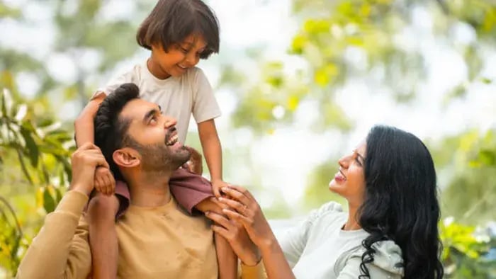 Indian parent in park with their kids