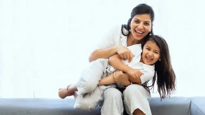 Expert Parenting Advice: Nurturing Happy and Healthy Children - Indian kid and mom playing at home