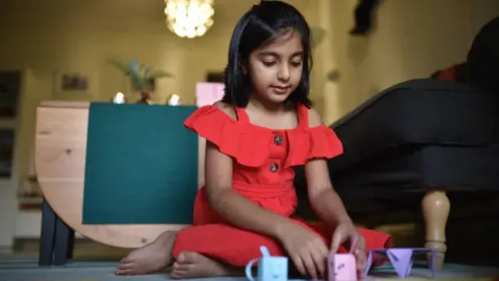 Indian Kid Doing Art And Craft
