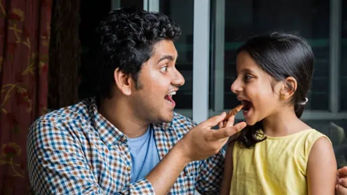 Indian kids eating food