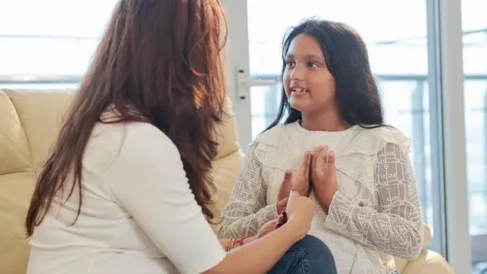 daughter talking to mother