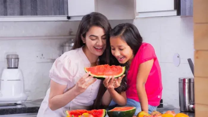Indian kids cooking with parents